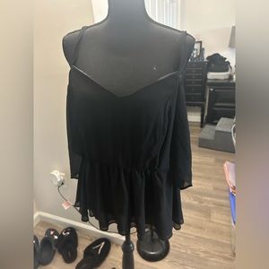 Nice black dressy blouse from torrid never used with tags.